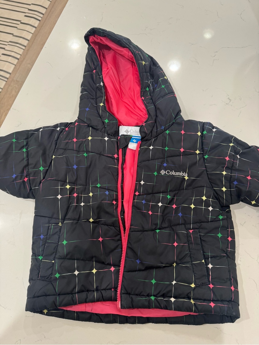 Columbia Kids' Black Puffer Jacket with Pink Lining and Multicolor Star Print